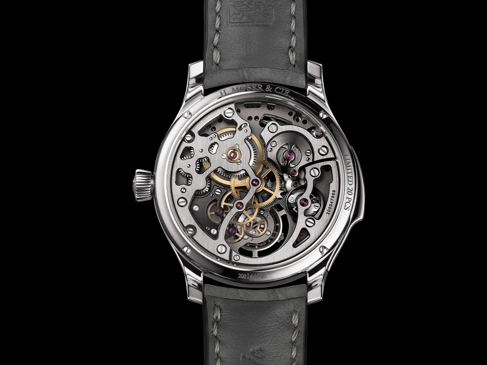 Official sapphire-caseback view of the H. Moser & Cie. HMC 909, showing its skeletonised bridges, gear train and hand finishing.