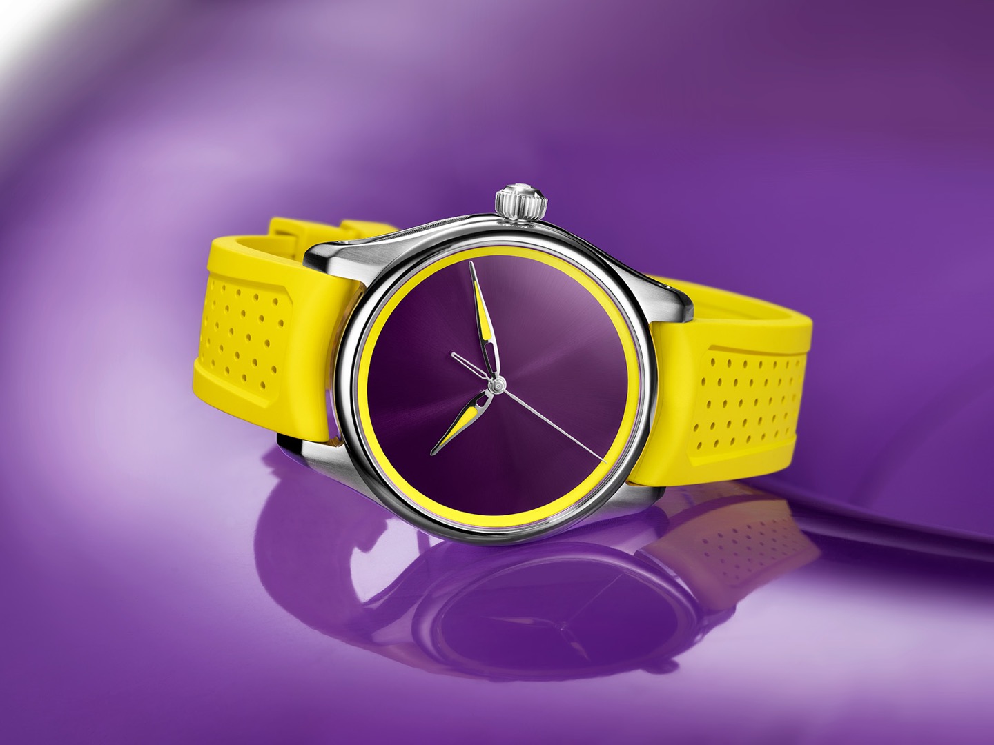 Official lifestyle image of the H. Moser Pioneer Centre Seconds Sun Berry on its yellow strap
