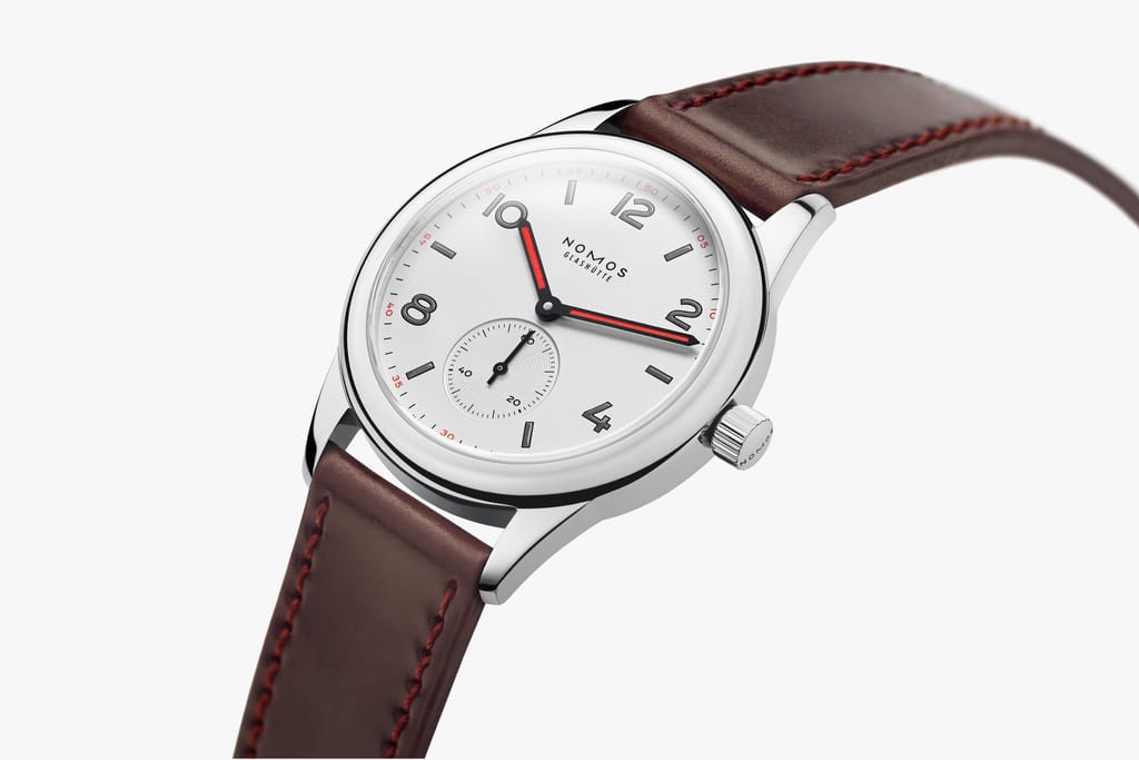 Official NOMOS image showing case profile, lugs, and strap behavior.
